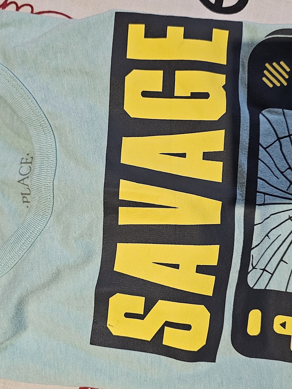 SAYAGÉ Graphic Tee in Light Blue with Yellow Print